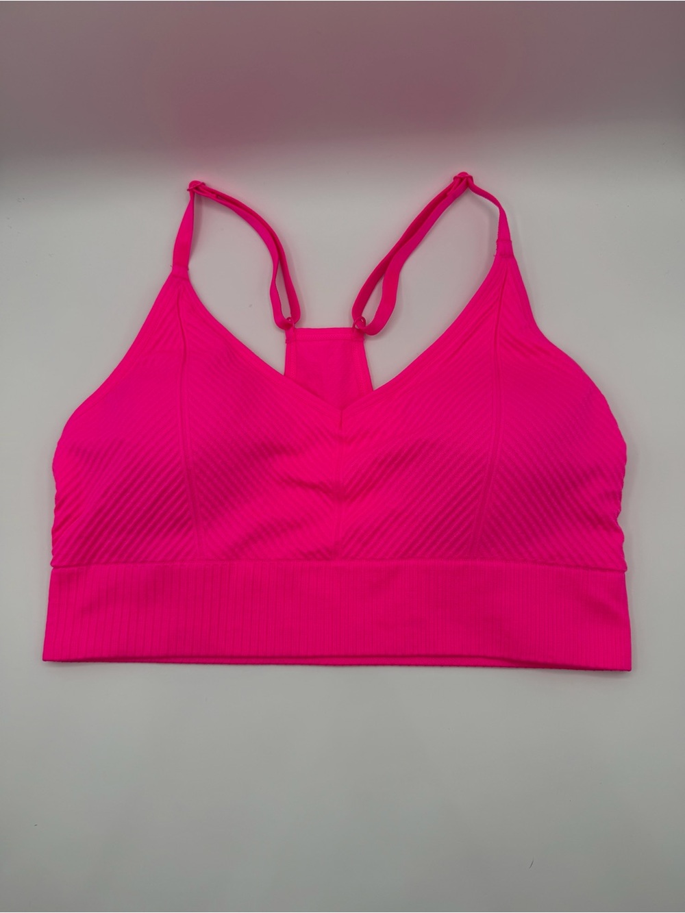 PINK Victoria's Secret Hot Pink Seamless V‑Neck Sports Bralette